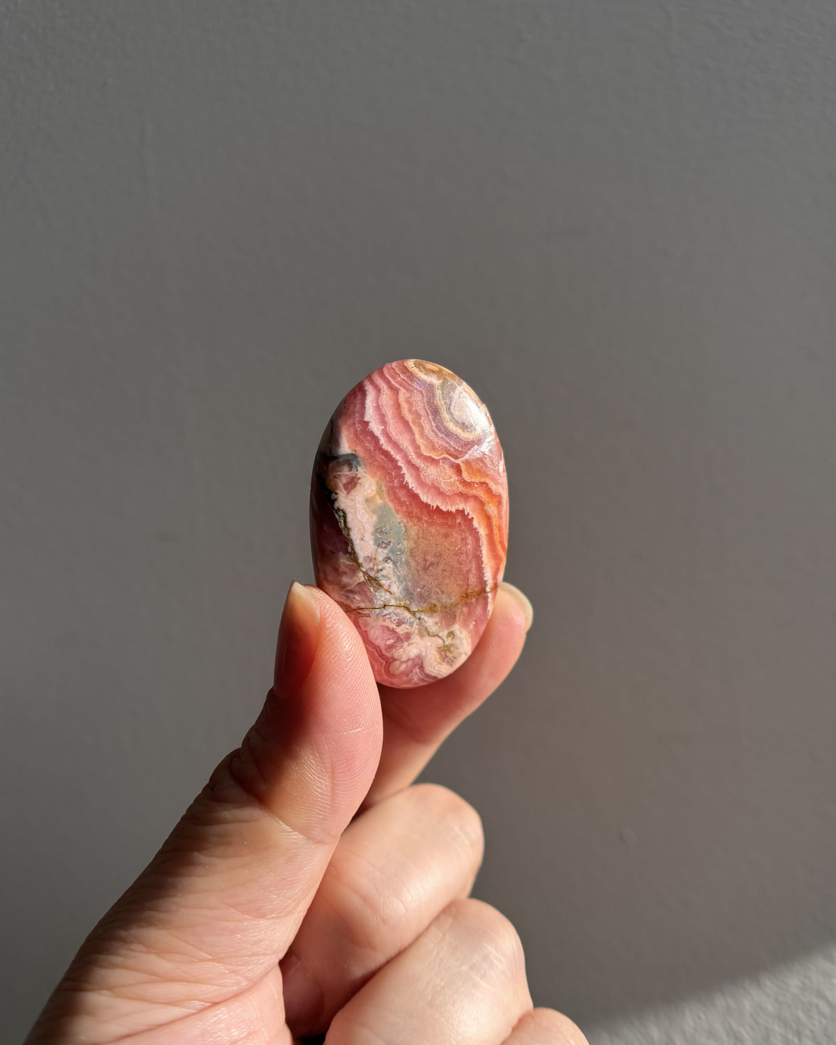 High-Grade Rhodochrosite Palmstone 27.7g