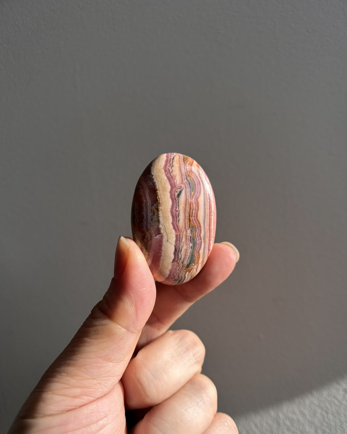 High-Grade Rhodochrosite Palmstone 38.5g