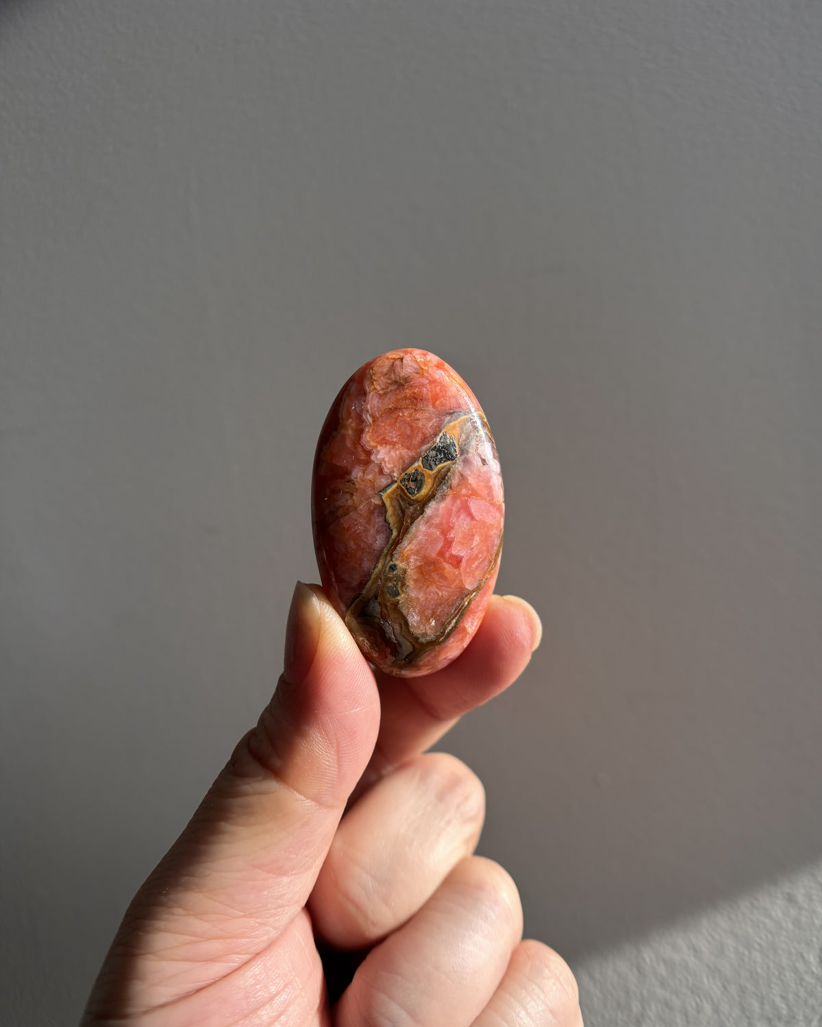 High-Grade Rhodochrosite Palmstone 40.4g