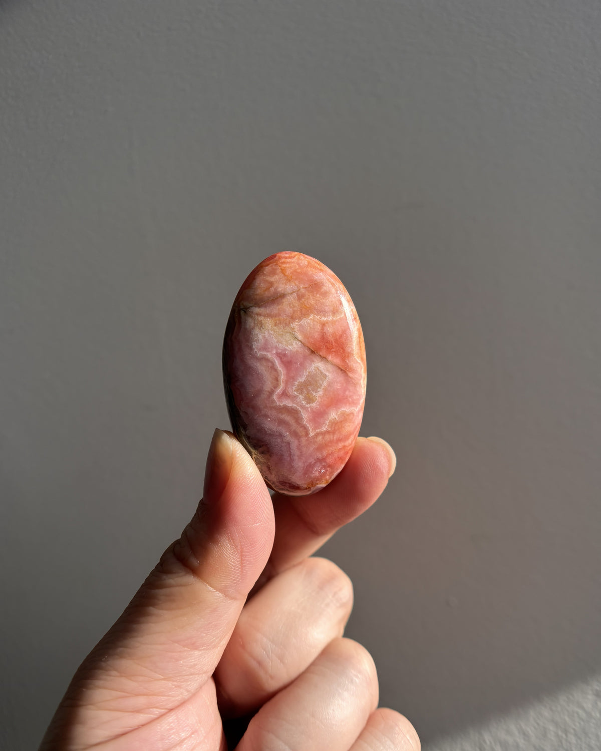 High-Grade Rhodochrosite Palmstone 40.4g