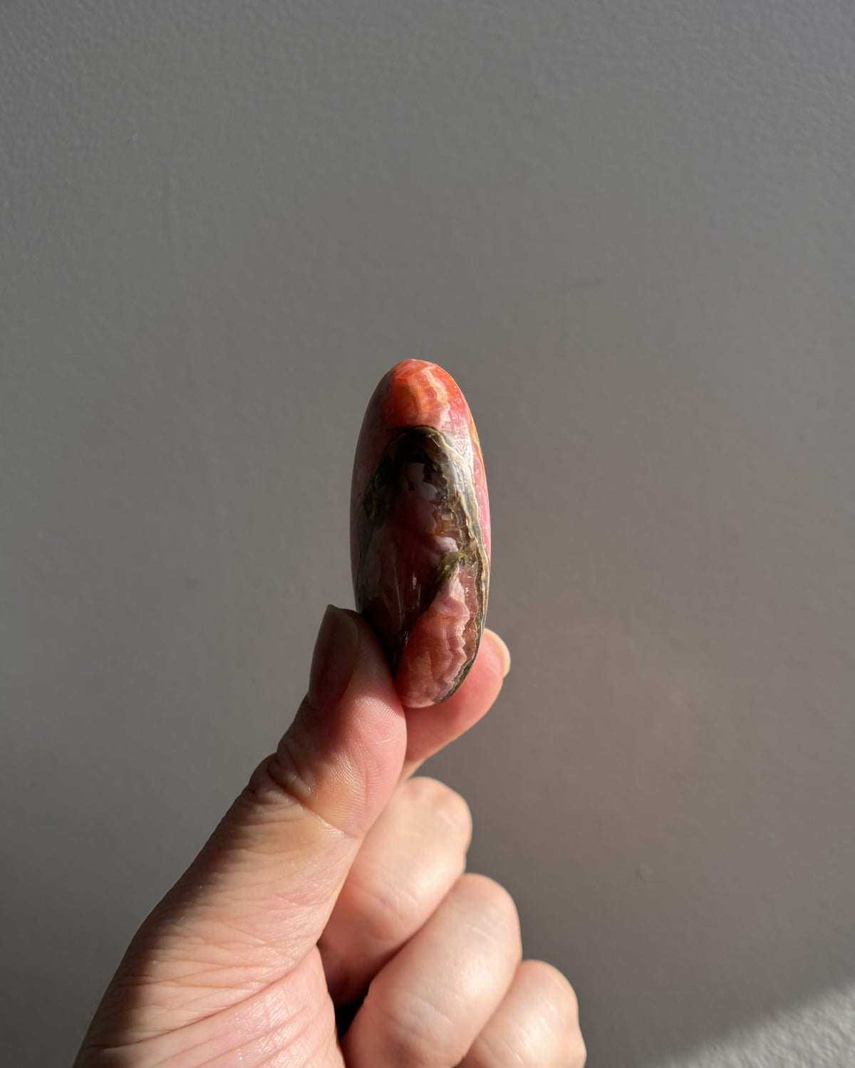 High-Grade Rhodochrosite Palmstone 40.4g