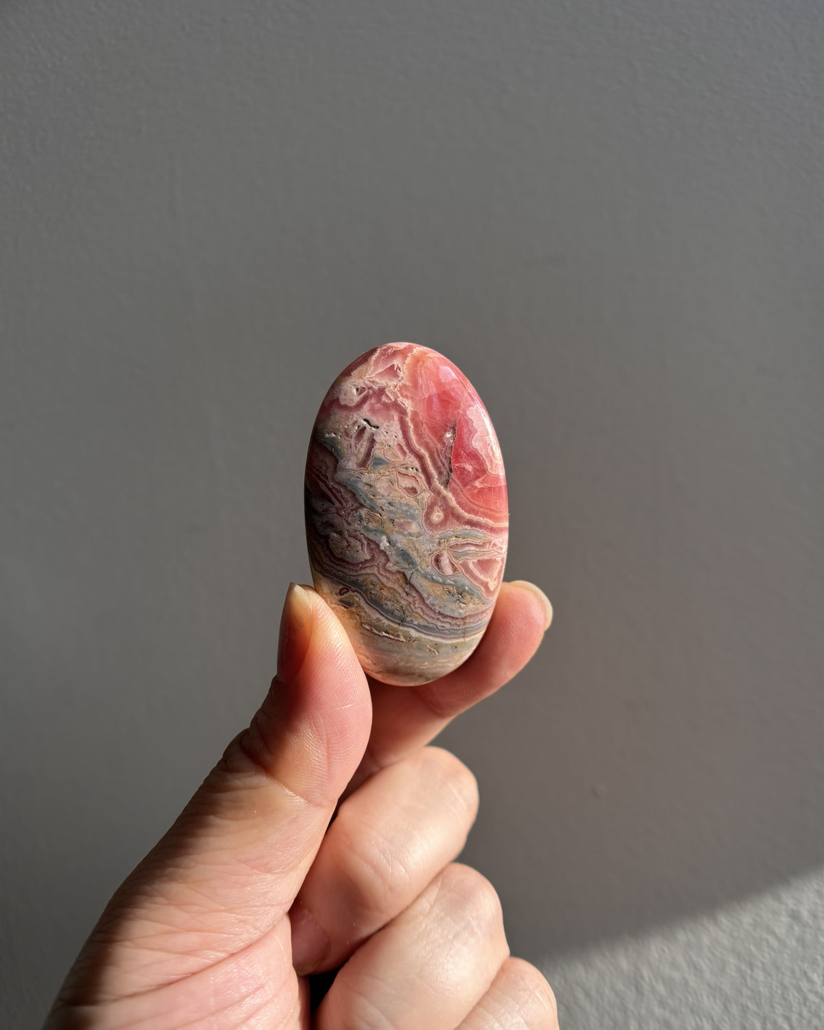 High-Grade Rhodochrosite Palmstone 40g